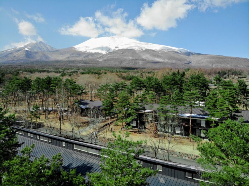 UWC ISAK Japan aerial view of the campus and local snow capped mountain