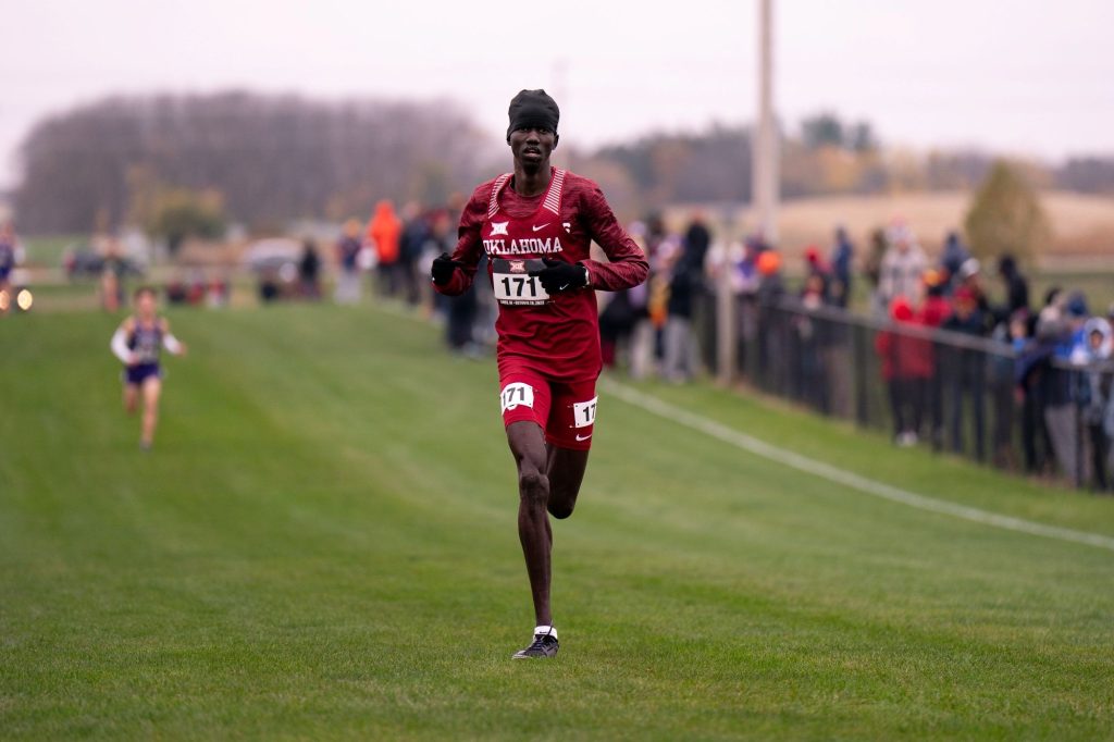 Peter representing the University of Oklahoma in a cross-country running event